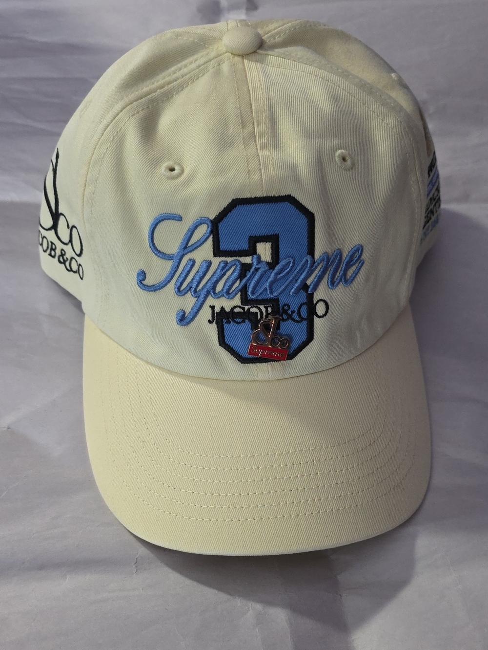 Supreme x La Martina x Jacob & Co collab light yellow cap brand new with tags.
